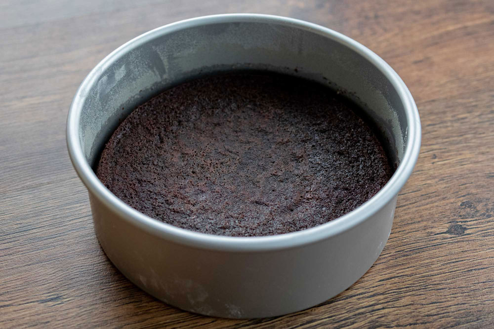 chocolate cake layer in a cake pan