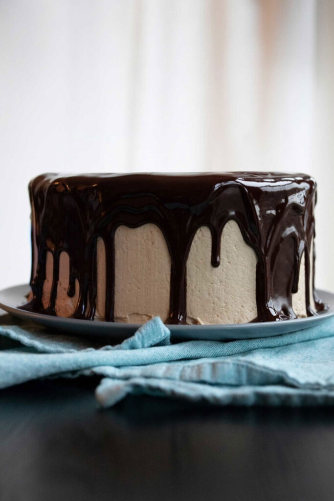 chocolate coffee cake covered in dark chocolate ganache