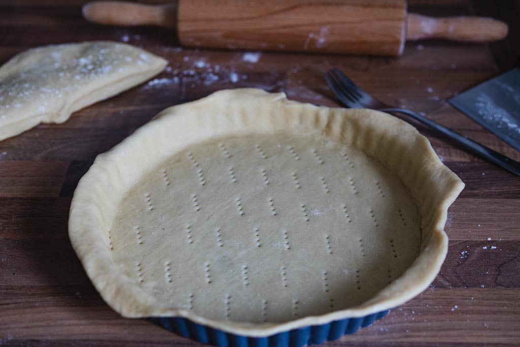 fit the dough in the tart pan