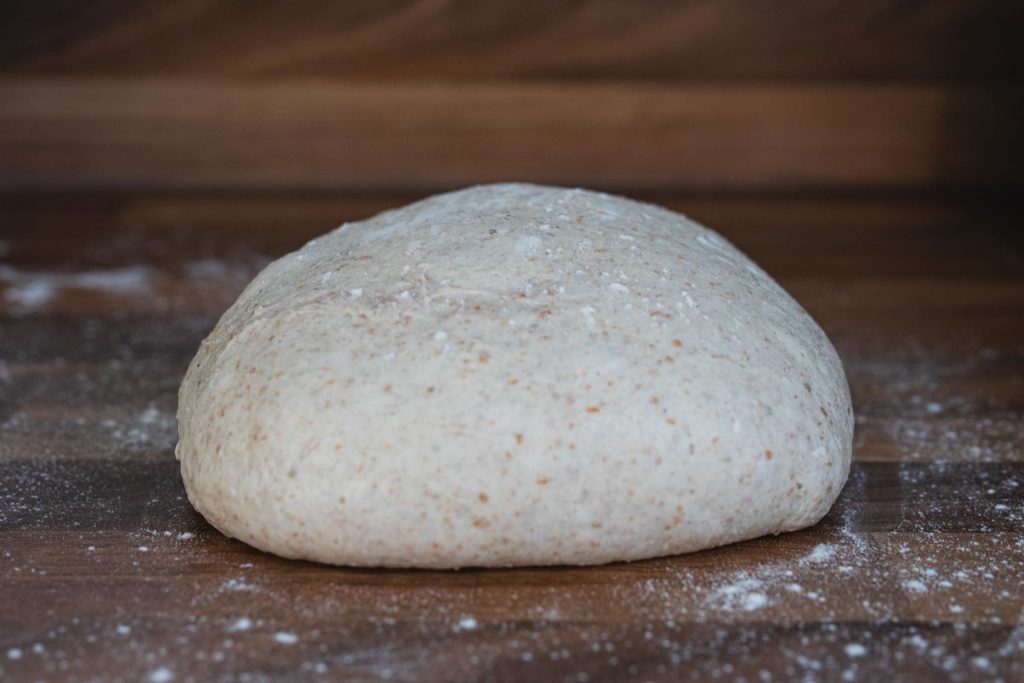 shaping a sourdough boule