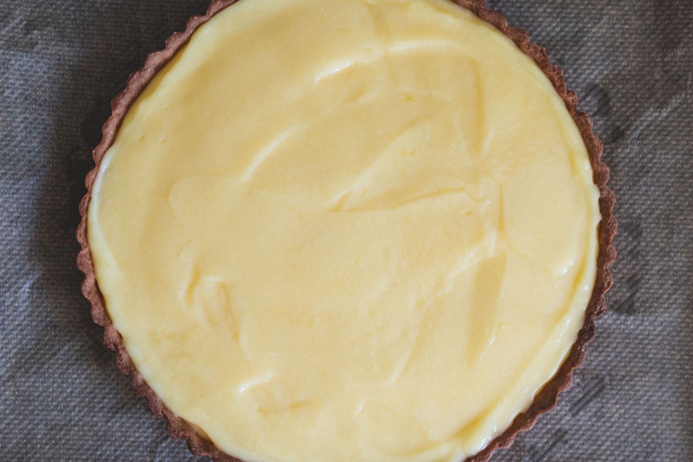 filling the tarte au citron lemon tart