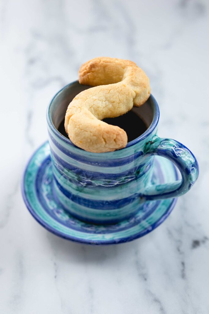 buranelli essi cookie with a cup of espresso