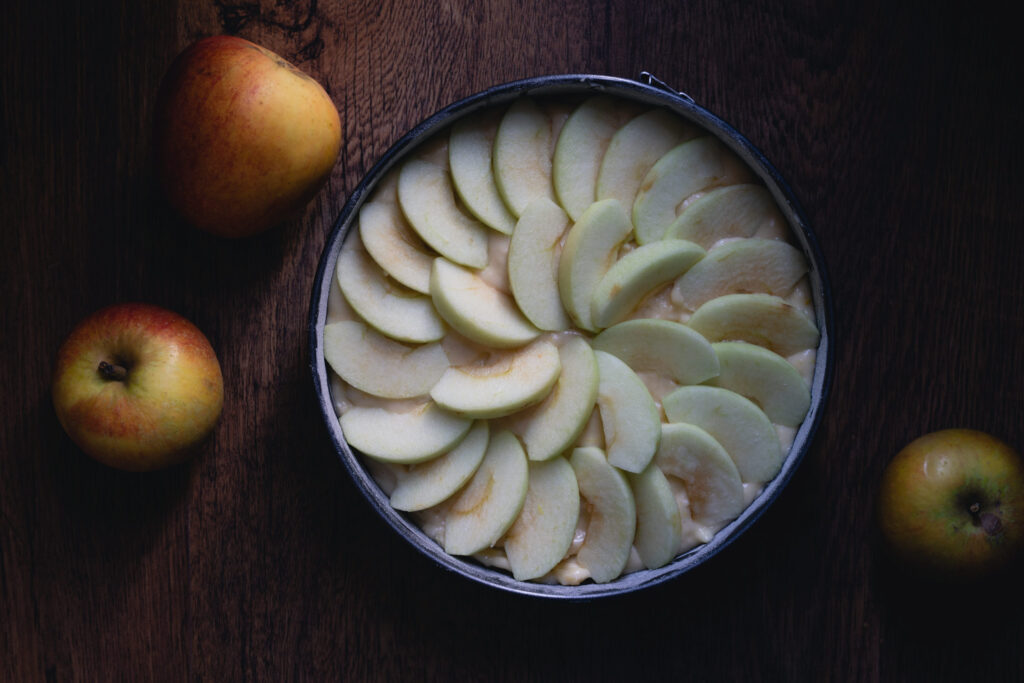 arrange the apple slices on top of the batter