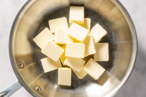 Uniform pieces of butter in a sauté pan