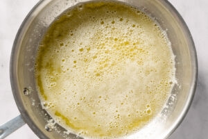 Melted butter simmering in a sauté pan